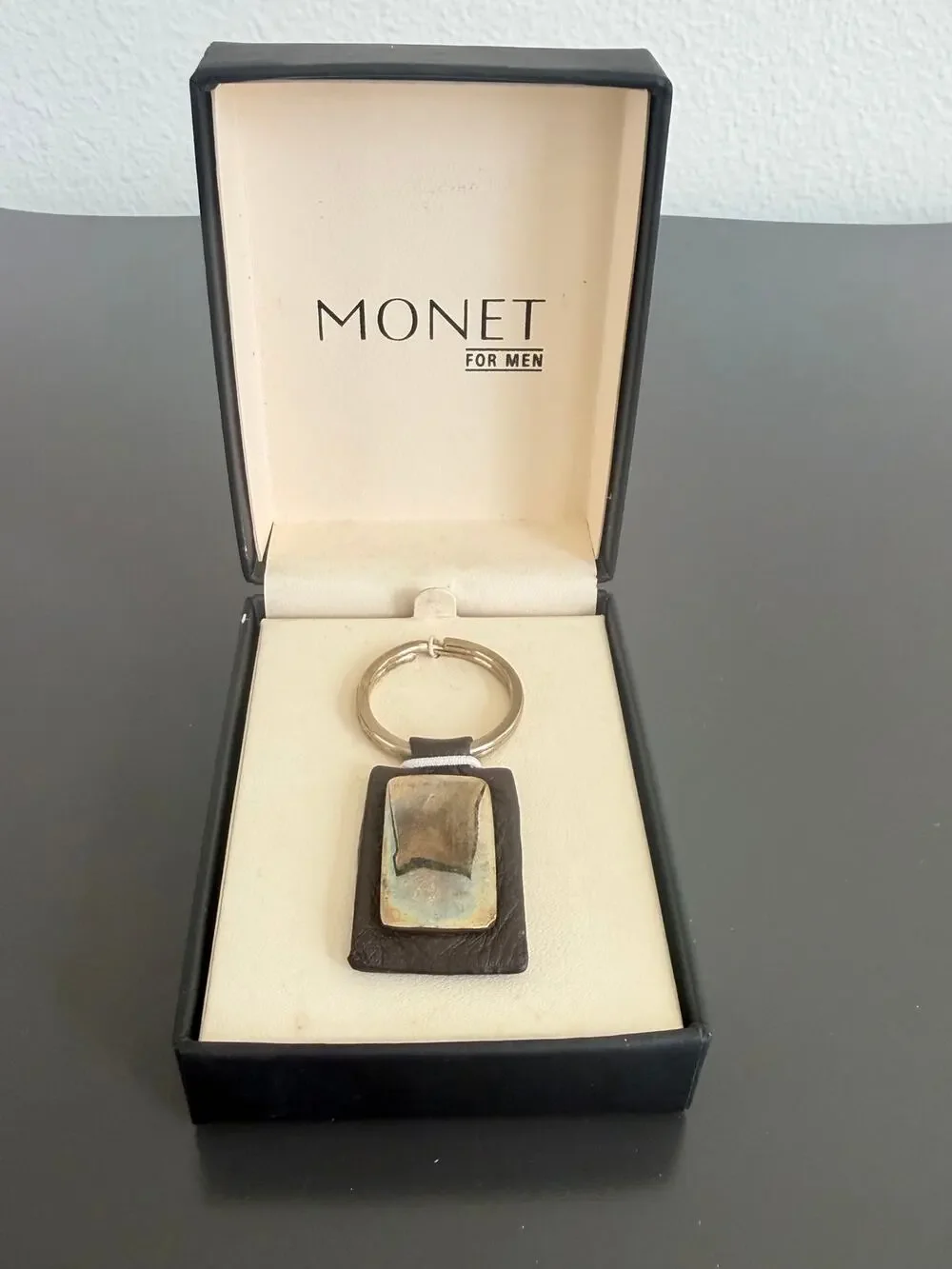 Vintage Monet for Men leather & metal keychain in its original branded box